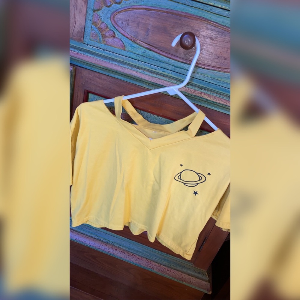 Yellow outer space crop top.